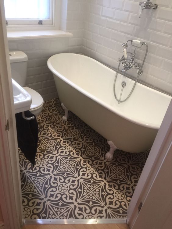 A shower bath combo in a small bathroom saves space